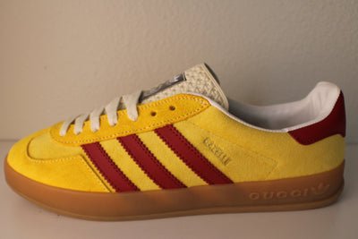 Red and Yellow Designar Adidas